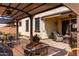 Charming patio with a fire pit, perfect for evening gatherings and outdoor enjoyment at 2731 E Cherry Hill Dr, Gilbert, AZ 85298
