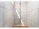 This shower features neutral tile and a decorative center strip at 2731 E Cherry Hill Dr, Gilbert, AZ 85298