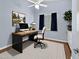 Functional office space with a modern desk, comfortable chair, and ample natural light at 29227 N 44Th St, Cave Creek, AZ 85331