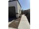 Backyard with desert landscaping, and outdoor seating area; zero maintenance yard at 3012 N 310Th Ln, Buckeye, AZ 85396