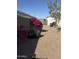 Private backyard with rock, foliage and block wall fencing at 3012 N 310Th Ln, Buckeye, AZ 85396