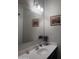 Bathroom features a single sink vanity, a large mirror, and neutral paint at 3012 N 310Th Ln, Buckeye, AZ 85396