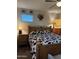Cozy bedroom with wood furniture including a bed, night stand, dresser, and ceiling fan at 3012 N 310Th Ln, Buckeye, AZ 85396