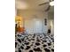 This bedroom features a closet, cow print blanket, lamp, and unique wall decor at 3012 N 310Th Ln, Buckeye, AZ 85396