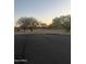 Quiet community featuring walking paths, mature trees, and a relaxing atmosphere at 3012 N 310Th Ln, Buckeye, AZ 85396