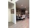 Inviting dining room featuring modern tile flooring and decorative wall art at 3012 N 310Th Ln, Buckeye, AZ 85396