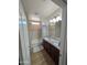 Bathroom features double sinks, granite countertops, and a shower-tub combination at 3085 E Patrick St, Gilbert, AZ 85295