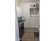 Bright laundry room with storage cabinets, granite countertop and gray scale washer and dryer at 3085 E Patrick St, Gilbert, AZ 85295