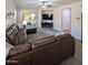 Relaxing living room with plush seating, modern entertainment setup, and seamless access to outdoor living at 3085 E Patrick St, Gilbert, AZ 85295