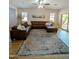 Inviting living room with comfortable seating, sleek flooring, and abundant natural light perfect for relaxation at 3085 E Patrick St, Gilbert, AZ 85295
