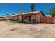 Backyard with covered patio, fenced yard, and potential for outdoor living and recreational activities at 3124 W Taro Ln, Phoenix, AZ 85027