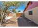 Well-maintained backyard with block fence and a newly landscaped area with fresh soil at 3124 W Taro Ln, Phoenix, AZ 85027