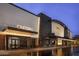 A modern Harkins CineGrill movie theater with inviting architecture and outdoor seating at 32237 N 133Rd Dr, Peoria, AZ 85383