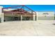 Exterior front entrance of Lake Pleasant Elementary School featuring covered walkway and accessible entrance at 32237 N 133Rd Dr, Peoria, AZ 85383