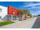 Exterior view of Liberty High School with modern architecture, colorful accents, and well-maintained grounds at 32237 N 133Rd Dr, Peoria, AZ 85383