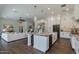 Open kitchen with an island, perfect for entertaining, that flows into the living space at 3229 E Campbell Ave, Phoenix, AZ 85018