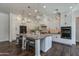 Spacious kitchen featuring a large island, custom cabinets, and modern appliances at 3229 E Campbell Ave, Phoenix, AZ 85018