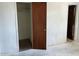 Bedroom features closet and unfinished flooring at 3419 W Glenn Dr, Phoenix, AZ 85051