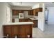 Functional kitchen with ample cabinet space and white appliances at 3419 W Glenn Dr, Phoenix, AZ 85051