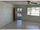 Bright living room with tile flooring and lots of natural light at 3419 W Glenn Dr, Phoenix, AZ 85051
