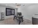 Bedroom featuring a desk and neutral carpet at 3623 S Agave Way, Chandler, AZ 85248