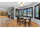 Bright dining area features a bay window with shutters and a modern light fixture at 3623 S Agave Way, Chandler, AZ 85248