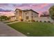 Charming two-story home featuring a well-manicured lawn and stucco exterior at 3623 S Agave Way, Chandler, AZ 85248