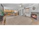 Open concept living area featuring a fireplace and updated kitchen at 3623 S Agave Way, Chandler, AZ 85248