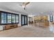 Open concept living area featuring a kitchen island, recessed lighting, and plenty of natural light at 3623 S Agave Way, Chandler, AZ 85248