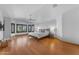 Spacious main bedroom with hardwood floors, large windows, and a ceiling fan for added comfort at 3623 S Agave Way, Chandler, AZ 85248