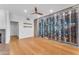 A temperature controlled wine cellar with a modern fan and hardwood floor at 3623 S Agave Way, Chandler, AZ 85248