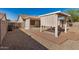 Spacious backyard with desert landscaping, and covered patio at 3885 E Lambeth Pl, San Tan Valley, AZ 85140