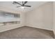 Neutral bedroom offering plush carpeting and natural light from a large window at 3885 E Lambeth Pl, San Tan Valley, AZ 85140