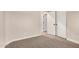 Neutral bedroom featuring carpeted floors and a closet with folding doors at 3885 E Lambeth Pl, San Tan Valley, AZ 85140
