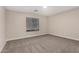 Bright bedroom featuring carpeted floors, a window with blinds, and neutral paint at 3885 E Lambeth Pl, San Tan Valley, AZ 85140
