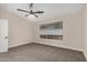 Bright bedroom featuring carpeted floors, a ceiling fan, and neutral paint at 3885 E Lambeth Pl, San Tan Valley, AZ 85140
