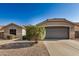 Charming single-story home with a two car garage and low maintenance desert landscaping at 3885 E Lambeth Pl, San Tan Valley, AZ 85140