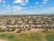 Beautiful aerial view of a residential community near golf course on a sunny day, Arizona real estate at 3933 E Meadowview Dr, Gilbert, AZ 85298