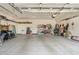 Spacious garage with ample storage, organized shelving, and plenty of room for parking and projects at 3933 E Meadowview Dr, Gilbert, AZ 85298