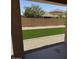 Private backyard featuring artificial turf and gravel, providing a low-maintenance outdoor space at 40800 W Rio Grande Dr, Maricopa, AZ 85138