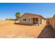 Backyard with covered patio and block wall fence at 40800 W Rio Grande Dr, Maricopa, AZ 85138