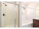 Bright bathroom featuring separate shower and soaking tub at 40800 W Rio Grande Dr, Maricopa, AZ 85138