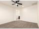 Neutral bedroom with carpet and ceiling fan at 40800 W Rio Grande Dr, Maricopa, AZ 85138