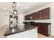 Kitchen with granite countertops, stainless appliances, updated fixtures, and lots of storage space at 40800 W Rio Grande Dr, Maricopa, AZ 85138