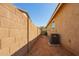 Sideyard with block wall and xeriscaping at 40800 W Rio Grande Dr, Maricopa, AZ 85138