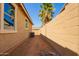 Sideyard with block wall and xeriscaping at 40800 W Rio Grande Dr, Maricopa, AZ 85138