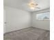 Neutral bedroom with a ceiling fan and natural light at 418 E Woodman Dr, Tempe, AZ 85283