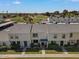 Inviting exterior of townhomes, close to a lush golf course at 418 E Woodman Dr, Tempe, AZ 85283