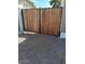 Wooden driveway gate in the backyard at 4309 E Alta Mesa Ave, Phoenix, AZ 85044