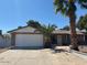 Charming single-story home with desert landscaping and a two-car garage at 4309 E Alta Mesa Ave, Phoenix, AZ 85044